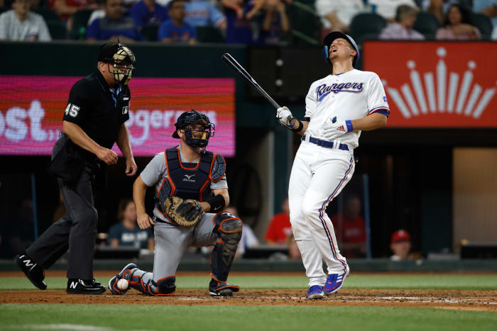 Jun 26, 2023; Arlington, Texas, USA; Texas Rangers shortstop Corey Seager (5) reacts after being hit by a pitch in the fifth inning against the Detroit Tigers at Globe Life Field. Mandatory Credit: Tim Heitman-USA TODAY Sports